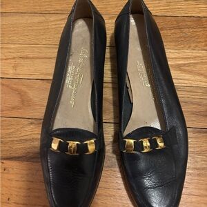 Salvatore Ferragamo Black Flats with Gold Accents